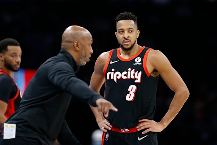 Jan 31, 2022; Oklahoma City, Oklahoma, USA; Portland Trail Blazers head coach Chauncey Billups talks to Portland Trail Blazers guard CJ McCollum (3) between plays against the Oklahoma City Thunder during the second quarter at Paycom Center.